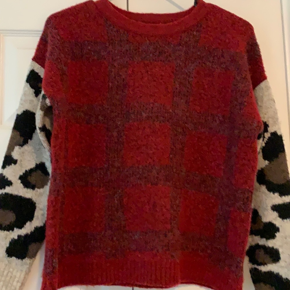 Multi color sweater.